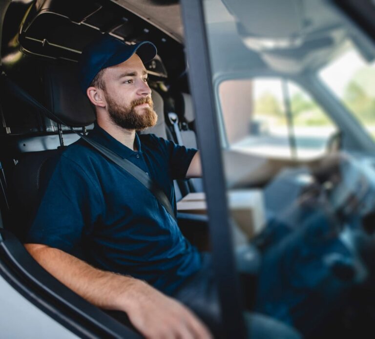 Truck driver in truck cab